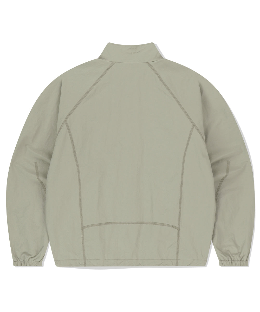 Mahagrid Cover Stitch Nylon Track Jacket [Beige]