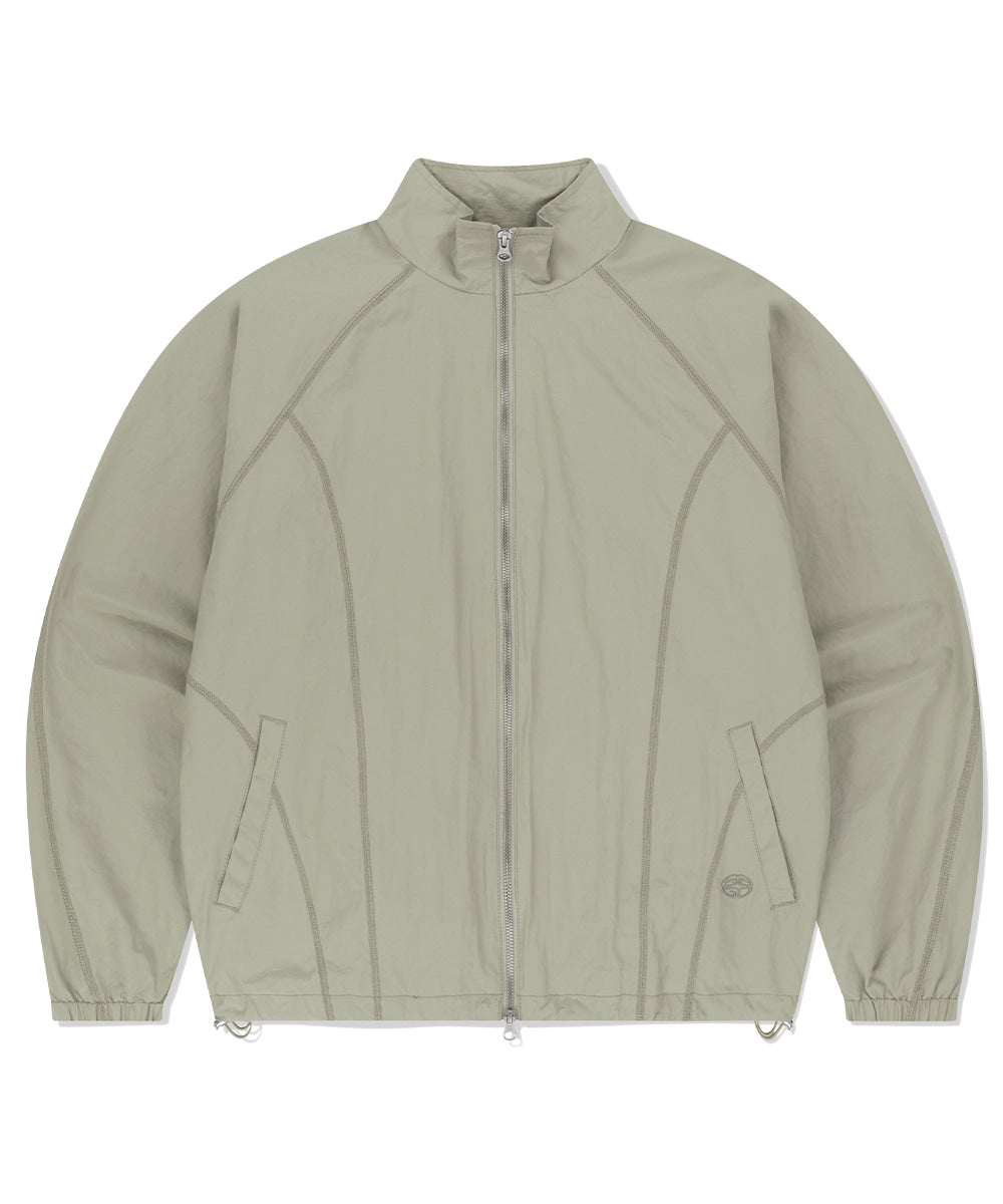 Mahagrid Cover Stitch Nylon Track Jacket [Beige]