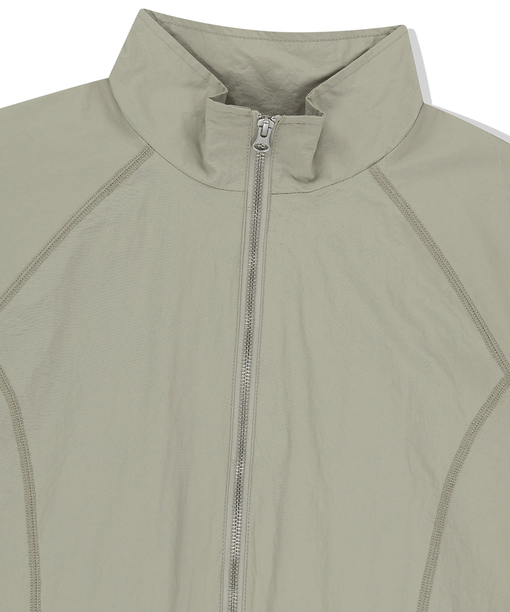 Mahagrid Cover Stitch Nylon Track Jacket [Beige]