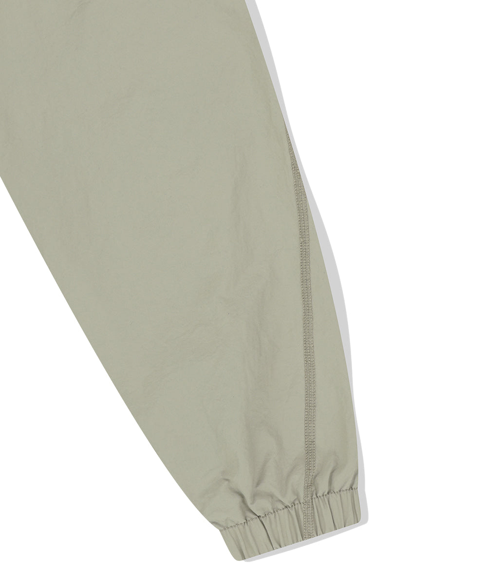 Mahagrid Cover Stitch Nylon Track Jacket [Beige]