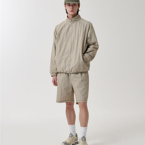 Mahagrid Cover Stitch Nylon Track Jacket [Beige]