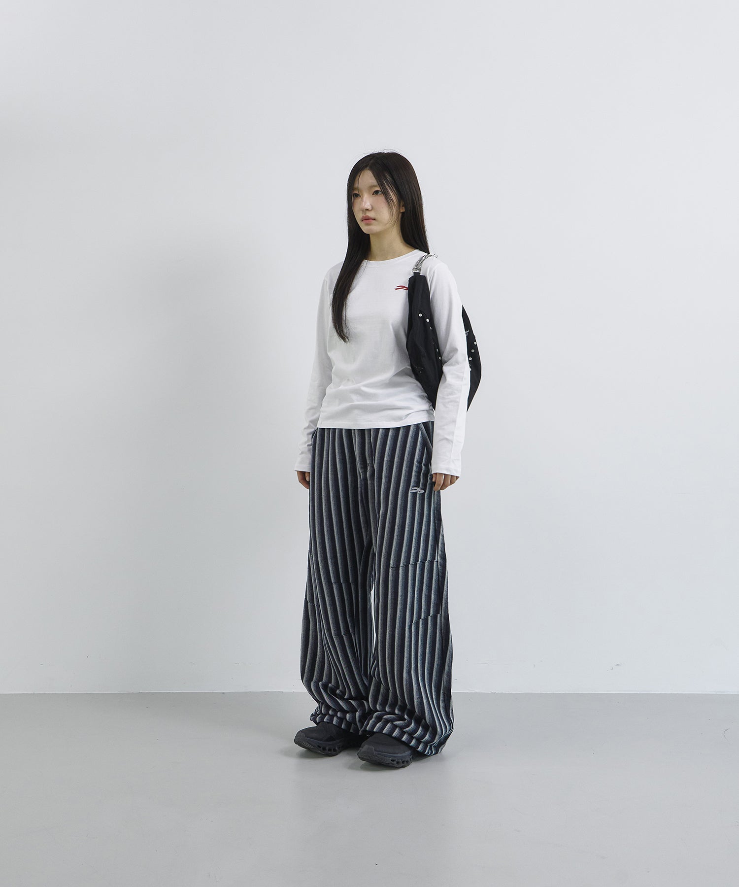 Tansanmagnesium Bone Diagonal Pants Blue